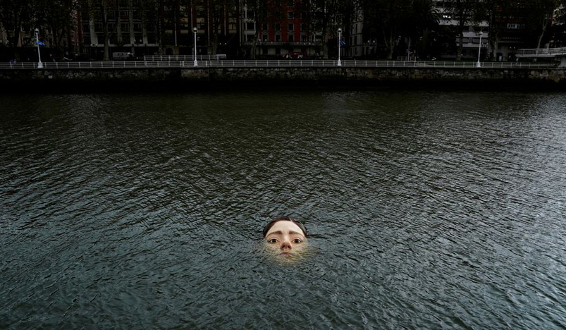Drowning girl statue in Bilbao